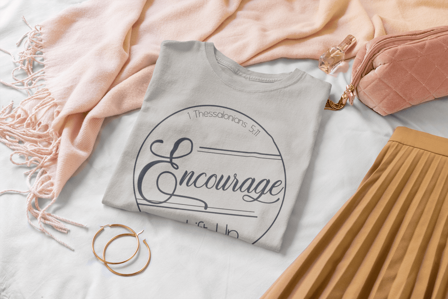 Starting your day with prayer is a great way to set the tone for the day and ask for guidance from the Holy Spirit. This tee shirt is a great way to share your faith with others and encourage them to step out in faith too. The Encourage and Lift Up tee shirt is a stylish and comfortable way to start conversations about God and help encourage others in their own faith journey.