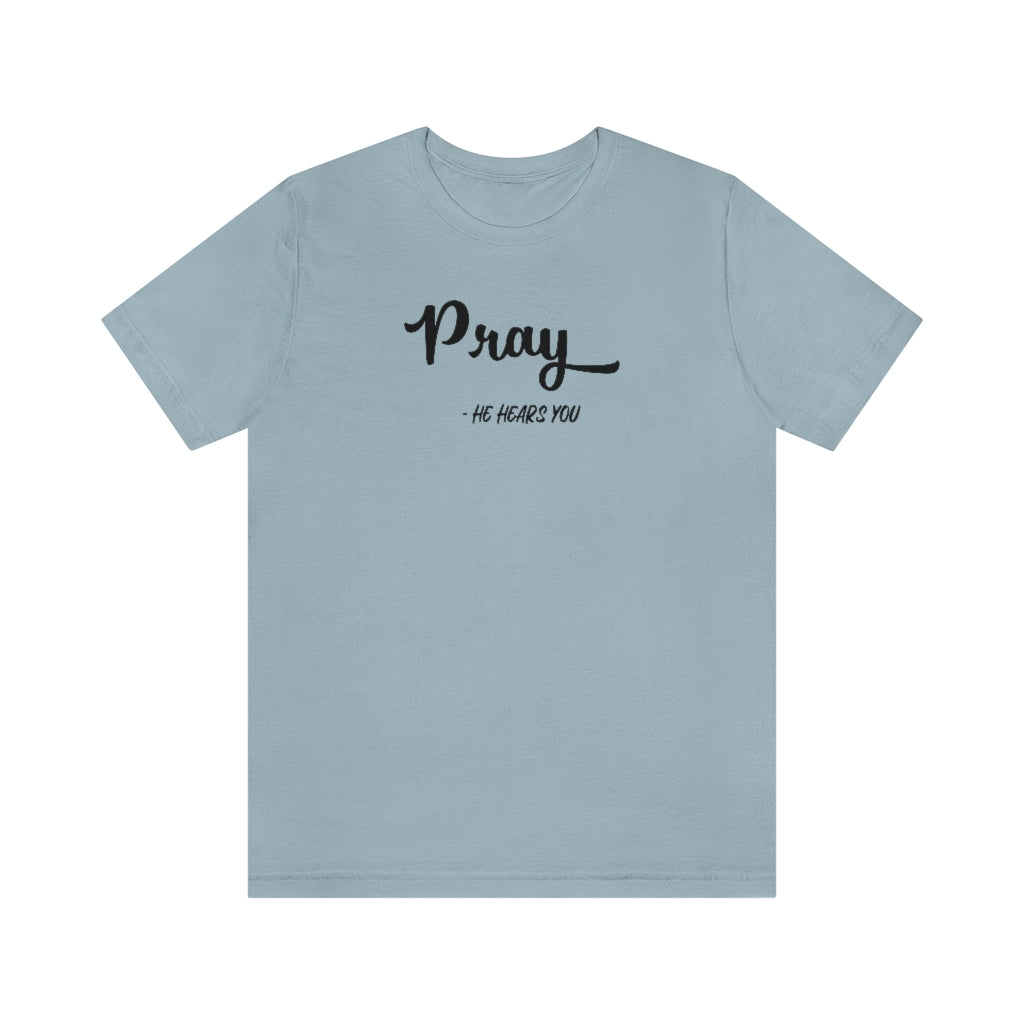 There are times in life when we all feel invisible and wonder if anyone is really listening. But with God, we know that He hears our prayers and sees us always. This Pray – He Hears You Tee Shirt is the perfect way to encourage yourself and others that God is always with us and hears us when we pray. 