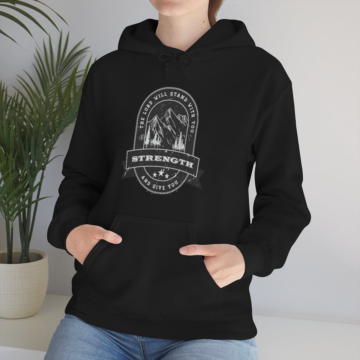 When you wear this hooded sweatshirt, you are instantly empowered with the truth that God will stand with you and give you strength. No matter what life throws your way, you can be hopeful knowing that the LORD is right by your side. This shirt is the perfect way to share your faith with those around you and let them know that they are not alone in their struggles. With its simple and encouraging message, you can help lead someone to Christ.