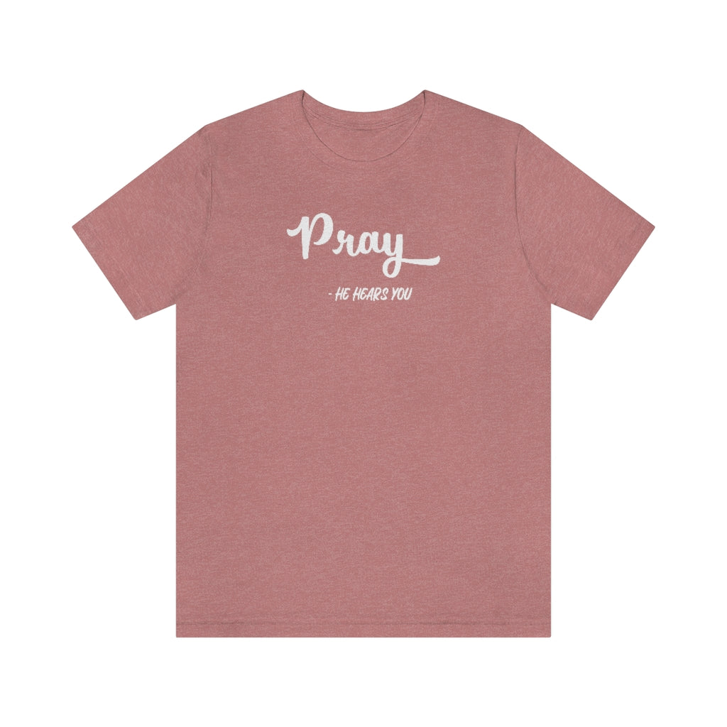 There are times in life when we all feel invisible and wonder if anyone is really listening. But with God, we know that He hears our prayers and sees us always. This Pray – He Hears You Tee Shirt is the perfect way to encourage yourself and others that God is always with us and hears us when we pray. 